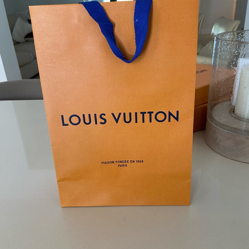 Four new and authentic designer bags